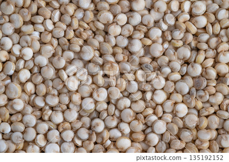 Wholesale market depiction of ecoconscious quinoa seed distribution, Closeup of quinoa grains illustrating environmentally friendly bulk trading methods in marketplace 135192152