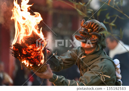 Nagata Shrine Traditional Oinashi Ceremony: Blue Demon Holding a Torch Nagata Shrine Traditional Oinashi Ceremony: Blue Demon Holding a Torch 135192583