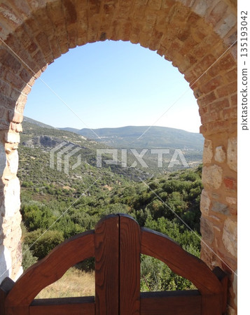 View through an arch near Megali Panagia 135193042
