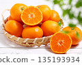 Lots of tangerines 135193934