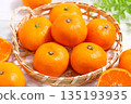 Lots of tangerines 135193935