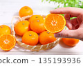 Lots of tangerines 135193936