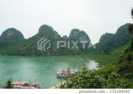 Halong Bay, a World Heritage Site, is located just outside of Hanoi, the capital of Vietnam. 135194043