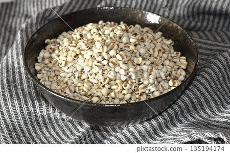 Job's tears in black bowl-Healthy food. Job's tears in black bowl-Healthy food. 135194174