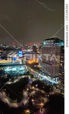 London, UK - January 1 2023: Surrounding View of London Eye at night London, UK - January 1 2023: Surrounding View of London Eye at night 135194365