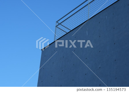 Blue sky and concrete wall architectural structure 135194573