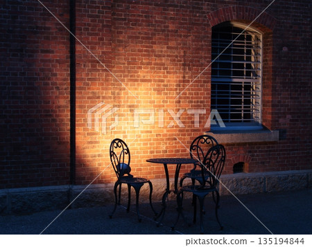 Scenery with a brick building and chairs Scenery with a brick building and chairs 135194844