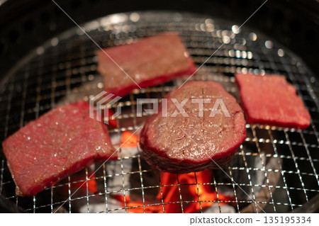 Hanwoo Beef, marbled Korean Style Meat on the Grill. BBQ rare meat with soft focus Hanwoo Beef, marbled Korean Style Meat on the Grill. BBQ rare meat with soft focus 135195334