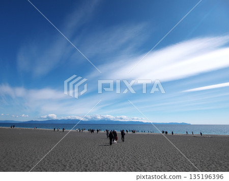 Blue sky, white clouds and coastline seen from the sandy beach of Miho no Matsubara Blue sky, white clouds and coastline seen from the sandy beach of Miho no Matsubara 135196396