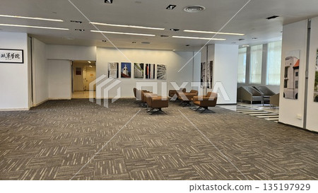 A stylish lounge with tables and sofa A stylish lounge with tables and sofa 135197929