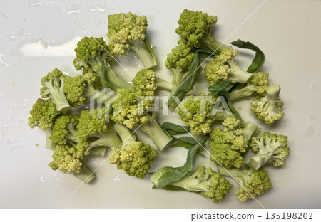Cut Romanesco on a white background 135198202