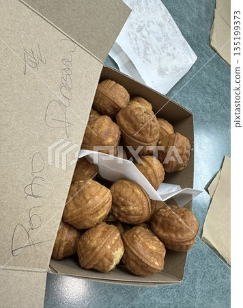Hodugwaja, Korean walnut-shaped pastry filled with sweet red bean paste and walnuts, featuring a soft outer layer and nutty, sweet flavor, often enjoyed as a traditional snack or gift Hodugwaja, Korean walnut-shaped pastry filled with sweet red bean paste and walnuts, featuring a soft outer layer and nutty, sweet flavor, often enjoyed as a traditional snack or gift 135199373
