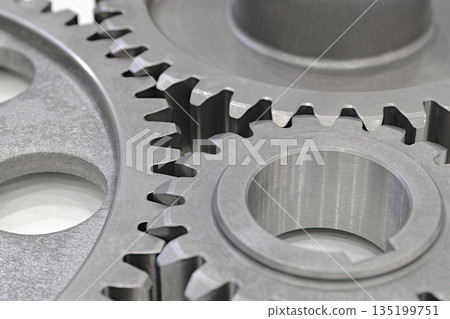 Three steel gearwheels, part of gear transmission 135199751