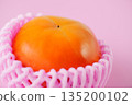 Shiny and richly sweet, the Fuyu persimmon has a vibrant warm orange color. 135200102