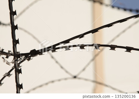 Abstract Metal Fence at Jail wall Abstract Metal Fence at Jail wall 135200136