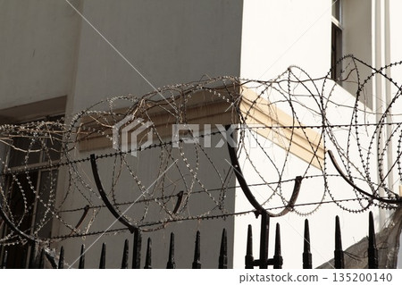 Abstract Metal Fence at Jail wall Abstract Metal Fence at Jail wall 135200140