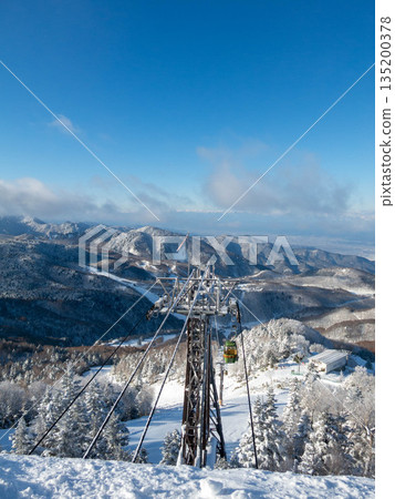 Shiga Kogen Giant Ski Resort and Higashidateyama Ski Resort seen from the Higashidateyama summit observation deck 135200378