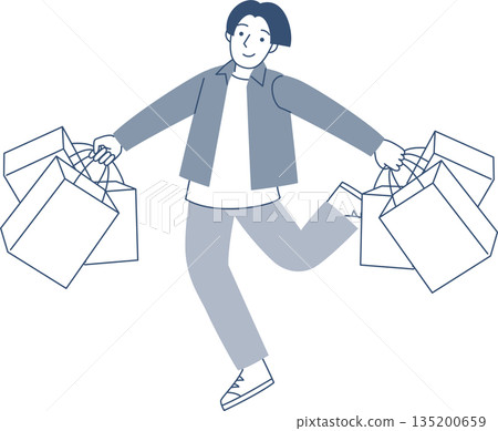 一個年輕男子帶著許多購物袋走路 135200659
