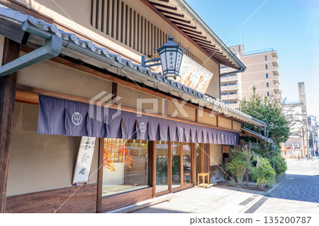 Nishijin, the town of textiles. Tsuruya Yoshinobu Main Store (Japanese confectionery shop) Established in 1811. Famous confectionery, Kyokanze and Yuzu mochi. Nishijin, the town of textiles. Tsuruya Yoshinobu Main Store (Japanese confectionery shop) Established in 1811. Famous confectionery, Kyokanze and Yuzu mochi. 135200787