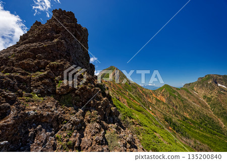 The rocky peaks of Nijusanyamine and the Yatsugatake mountain range, Mount Akadake and Mount Amidadake The rocky peaks of Nijusanyamine and the Yatsugatake mountain range, Mount Akadake and Mount Amidadake 135200840