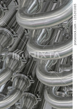 A lot of shiny curved stainless steel pipes of industrial equipment cooling system 135201085