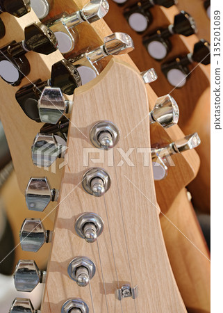 Group of guitars, traditional stringed musical instruments 135201089