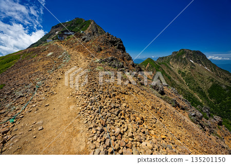 View of the Yatsugatake mountain range, Mount Akadake and Mount Amidadake from near the Jizo Ridge junction View of the Yatsugatake mountain range, Mount Akadake and Mount Amidadake from near the Jizo Ridge junction 135201150