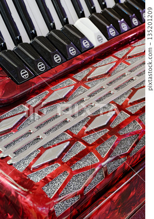 Accordion, bellows-driven musical instrument Accordion, bellows-driven musical instrument 135201209
