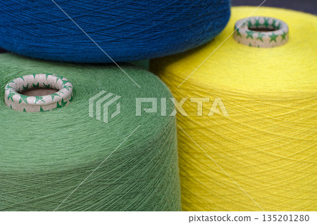 Spools of multi-colored wool threads Spools of multi-colored wool threads 135201280