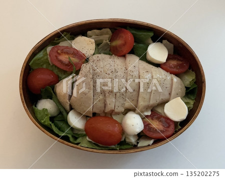 A traditional Korean dosirak, beautifully arranged with rice, assorted banchan, and savory proteins. Balanced and visually inviting, it’s a portable meal packed with vibrant flavors. 135202275