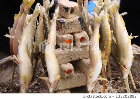 Grilled salted sweetfish sold in store 135202892