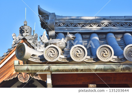 Demon-faced roof tile at Toji-in Temple 135203644