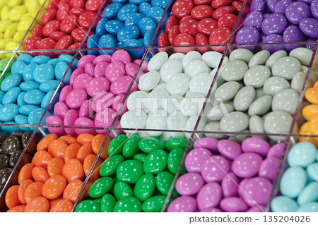 Multi-colored round glazed dragee candies Multi-colored round glazed dragee candies 135204026