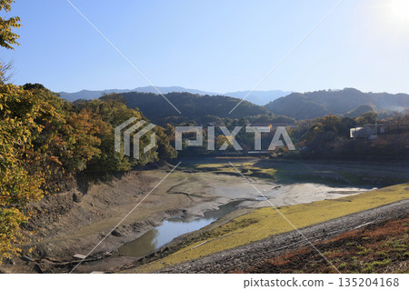 Togawa Dam in Saita-cho, Mitoyo City, drained of water in winter Togawa Dam in Saita-cho, Mitoyo City, drained of water in winter 135204168