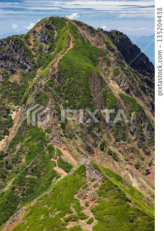 Amida-dake seen from just below the summit of Aka-dake in the Yatsugatake mountain range Amida-dake seen from just below the summit of Aka-dake in the Yatsugatake mountain range 135204438