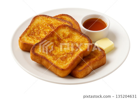 Delicious golden brown French toast served with butter and maple syrup on a white plate for a perfect breakfast Delicious golden brown French toast served with butter and maple syrup on a white plate for a perfect breakfast 135204631