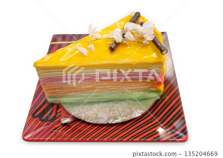 Die cut of rainbow crepe cake on white isolated. 135204669