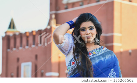 Young Indian woman wearing sari in Moscow Young Indian woman wearing sari in Moscow 135205502