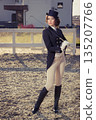 beautiful girl jockey posing 135207766