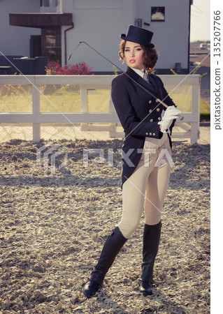beautiful girl jockey posing beautiful girl jockey posing 135207766