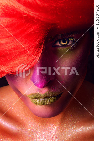 close-up. creative portrait of a girl with bright makeup and red hair 135207910