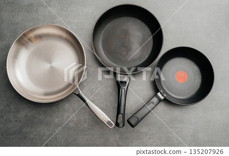 Different Frying Pans Comparison Flat Lay Different Frying Pans Comparison Flat Lay 135207926