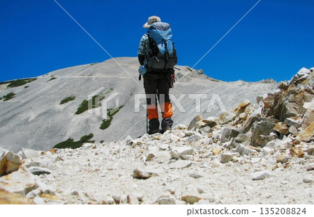 A woman climbing alone (Hakuba Yari-ga-take) A woman climbing alone (Hakuba Yari-ga-take) 135208824