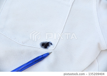 blue blue ink dirty stain  on white shirt for cleaning concept idea in work house 135209404