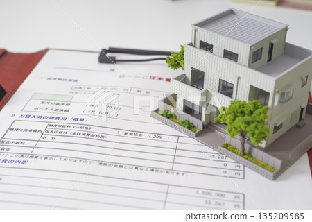 Model house and mortgage application documents 135209585