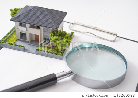 Image of a buyer checking a real estate contract Image of a buyer checking a real estate contract 135209588