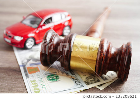 Bangkok, Thailand March 15, 2024 Car accident lawsuit and insurance, Judge hammer and money with car model. Bangkok, Thailand March 15, 2024 Car accident lawsuit and insurance, Judge hammer and money with car model. 135209621