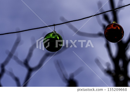 Christmas tree with red and green ball decorations Christmas tree with red and green ball decorations 135209668