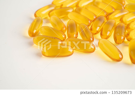 Fish oil or Cod liver oil gel in capsules with omega 3 vitamins, supplementary healthy food. 135209673