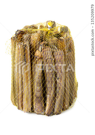 Fresh raw razor clams in mesh net isolated on white background Fresh raw razor clams in mesh net isolated on white background 135209979